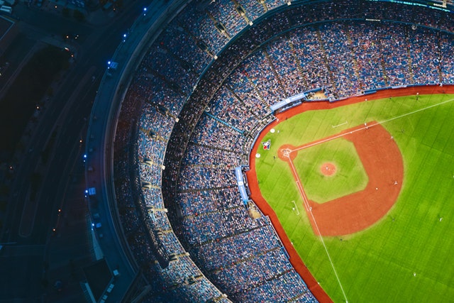 Busch Stadium grounds crew cuts patterns into grass in St. Louis